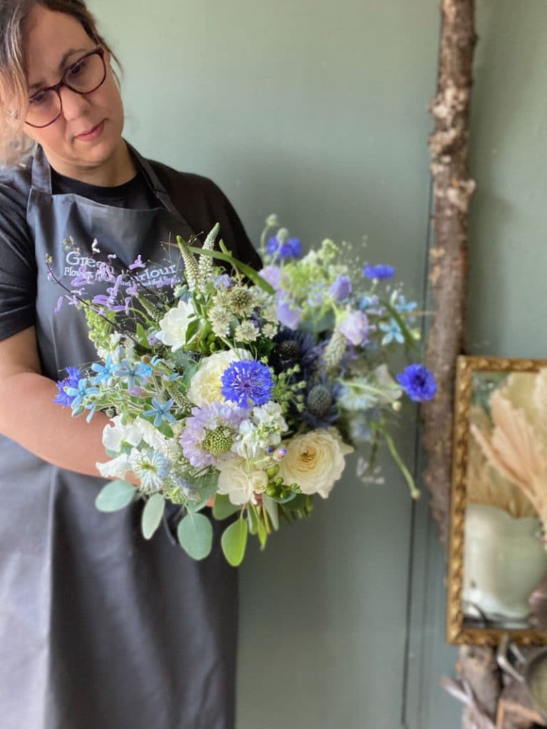 A soft purple and blue bridal wedding bouquet for a wedding at Rushall Farm, Bradfield. Using summer flowers including sweet peas, clematis, scabiosa, cornflower and astrantia