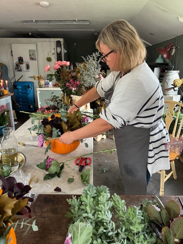 pumpkin flower design class teaching beginners how to arrange flowers in our flower school