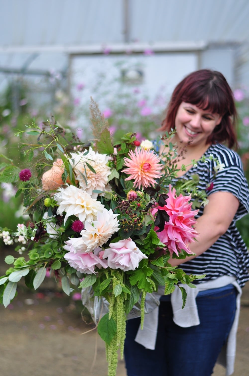 Natural hand-tied bouquet created by a florist, showing seasonal flowers and soft garden style
